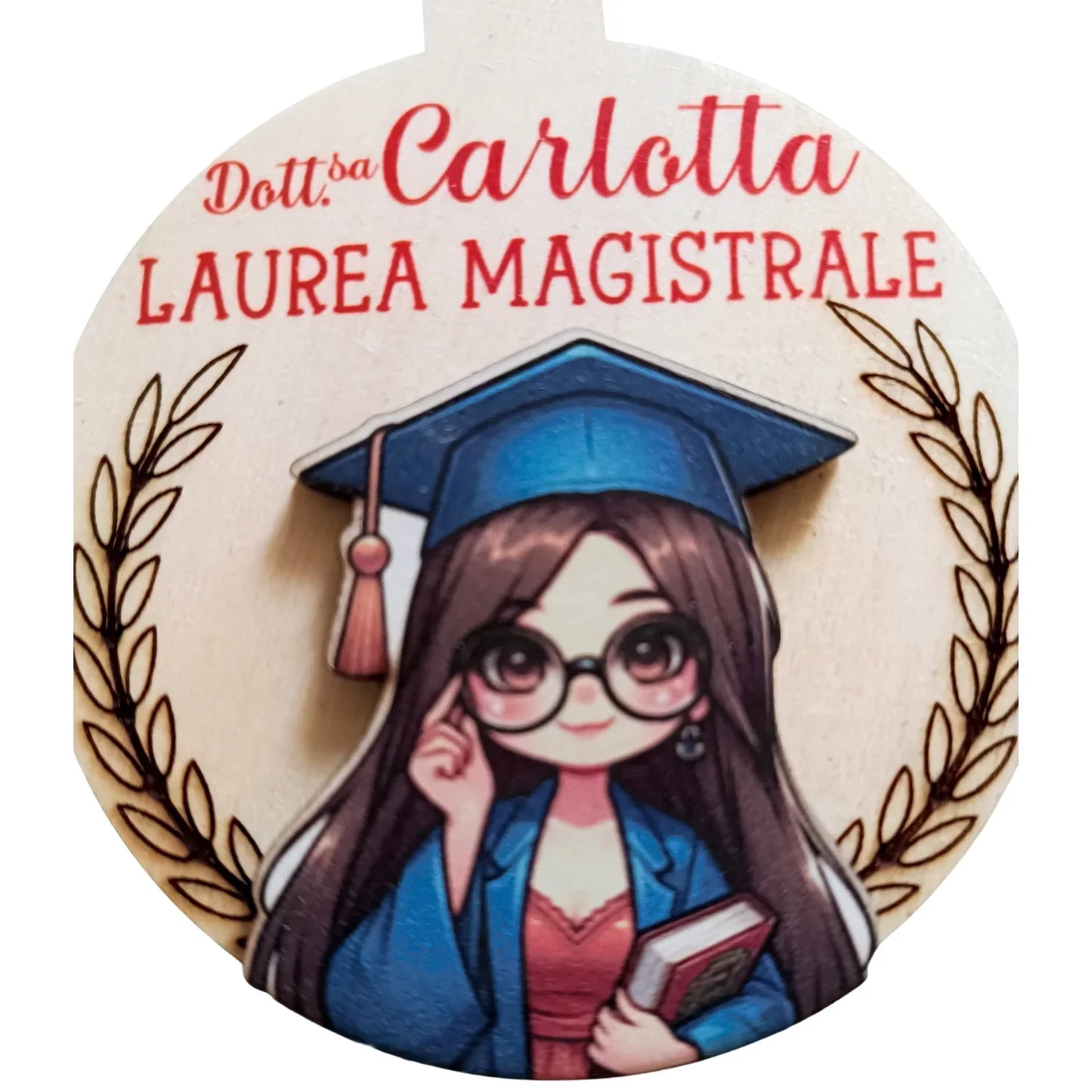 Cartoon graduate in blue cap and gown with glasses, book, laurel wreath, Laurea Magistrale text