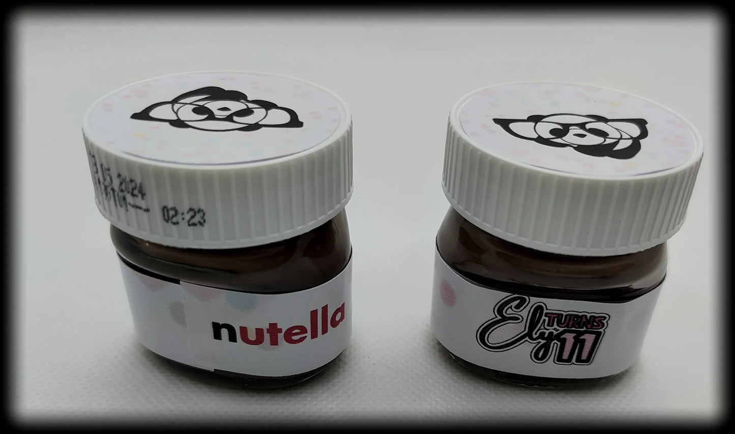 Two mini Nutella jars with custom labels and panda design on white lids, party favor theme