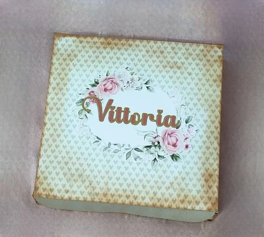 Vintage floral gift box with 'Vittoria' name, rose pattern, pastel green background