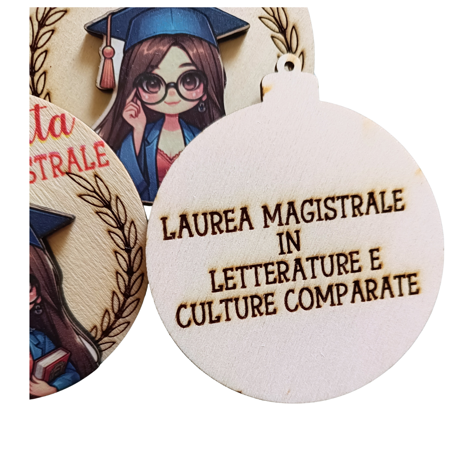 Wooden graduation ornament with cartoon graduate and Italian text Laurea Magistrale in Letterature e Culture Comparate