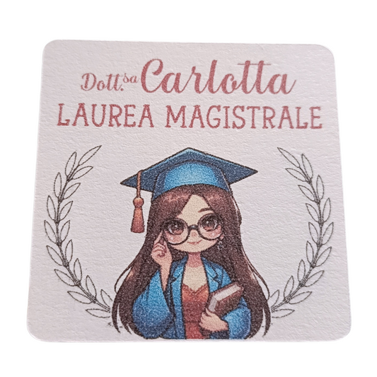 Cartoon girl in graduation gown and cap holding book, laurea magistrale text, laurel branches
