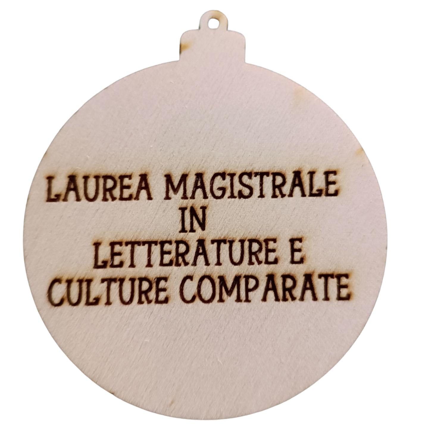 Wooden ornament with Italian text 'Laurea Magistrale in Letterature e Culture Comparate' engraved