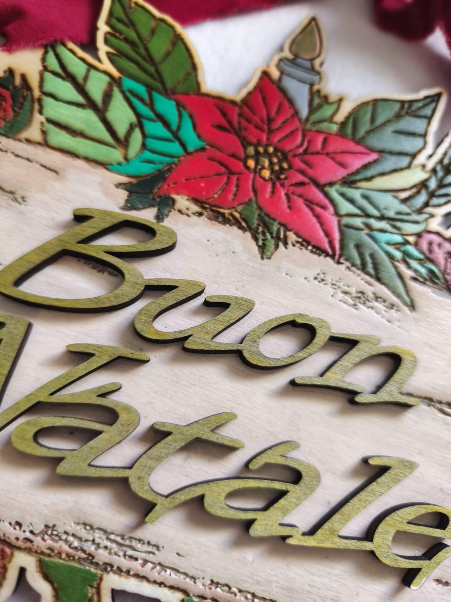 Wooden Buon Natale sign with poinsettia flower and candle Christmas decoration